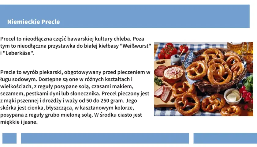 Tradycyjne niemieckie precle, popularne jedzenie w Niemczech, podane z kiełbasą, serem i piwem.